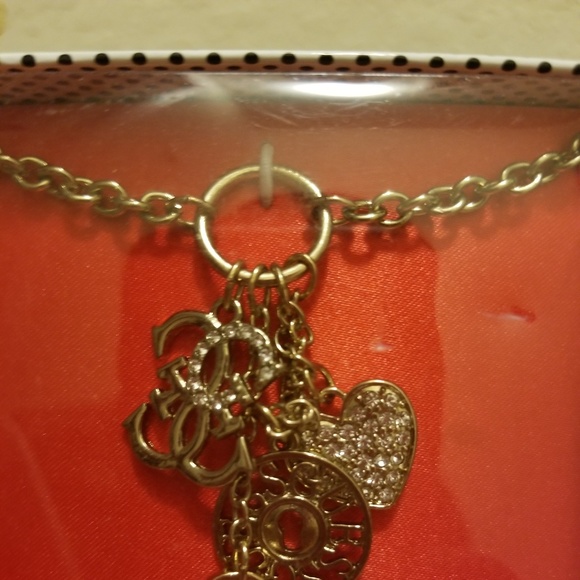 Guess Jewelry - Guess Necklace with key in charms with earrings